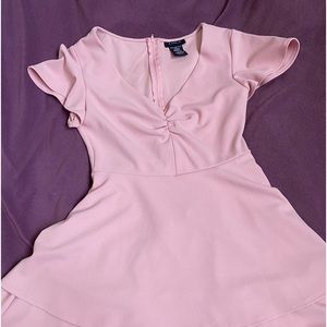 Cute pink short dress. Easy wash and wear. It was only wore two twice.